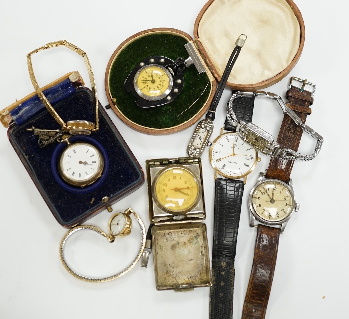 A small group of assorted wrist watches including Ingersoll and A.T.P. military, a Rolex watch movement and a silver pocket watch.
